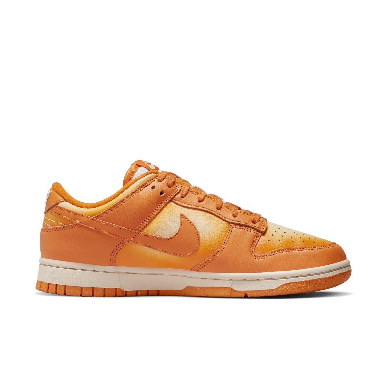 Nike Dunk Low Magma Orange sneakers for women, featuring vibrant orange colorway and classic design.