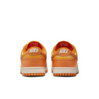 Nike Dunk Low Magma Orange women's sneakers, featuring a vibrant orange design with classic Nike branding.