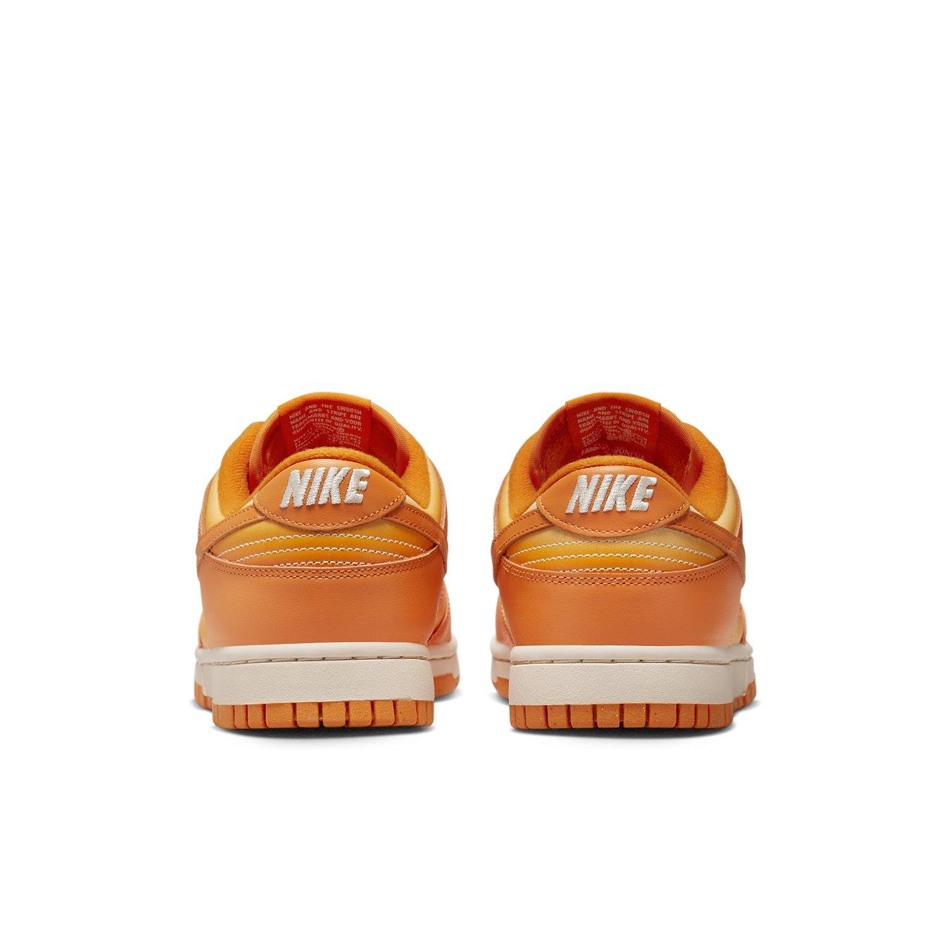 Nike Dunk Low Magma Orange women's sneakers, featuring a vibrant orange design with classic Nike branding.