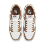 Nike Dunk Low Medium Curry sneakers view from above, featuring Sail and Fossil hues with Medium Curry accents.