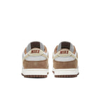 Nike Dunk Low Medium Curry sneakers, back view with brown and beige colorway, showcasing iconic branding.