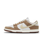 Nike Dunk Low Medium Curry sneaker featuring Sail, Fossil, and Medium Curry color pops.