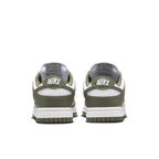 Nike Dunk Low Medium Olive (W) sneakers with white and olive panels, featuring the Nike logo on the heels.