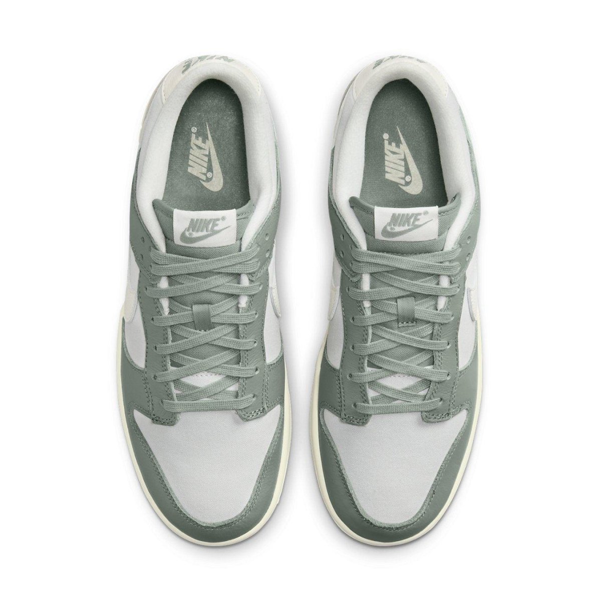 Nike Dunk Low Mica Green sneaker with a vintage design featuring a mix of suede and canvas materials.