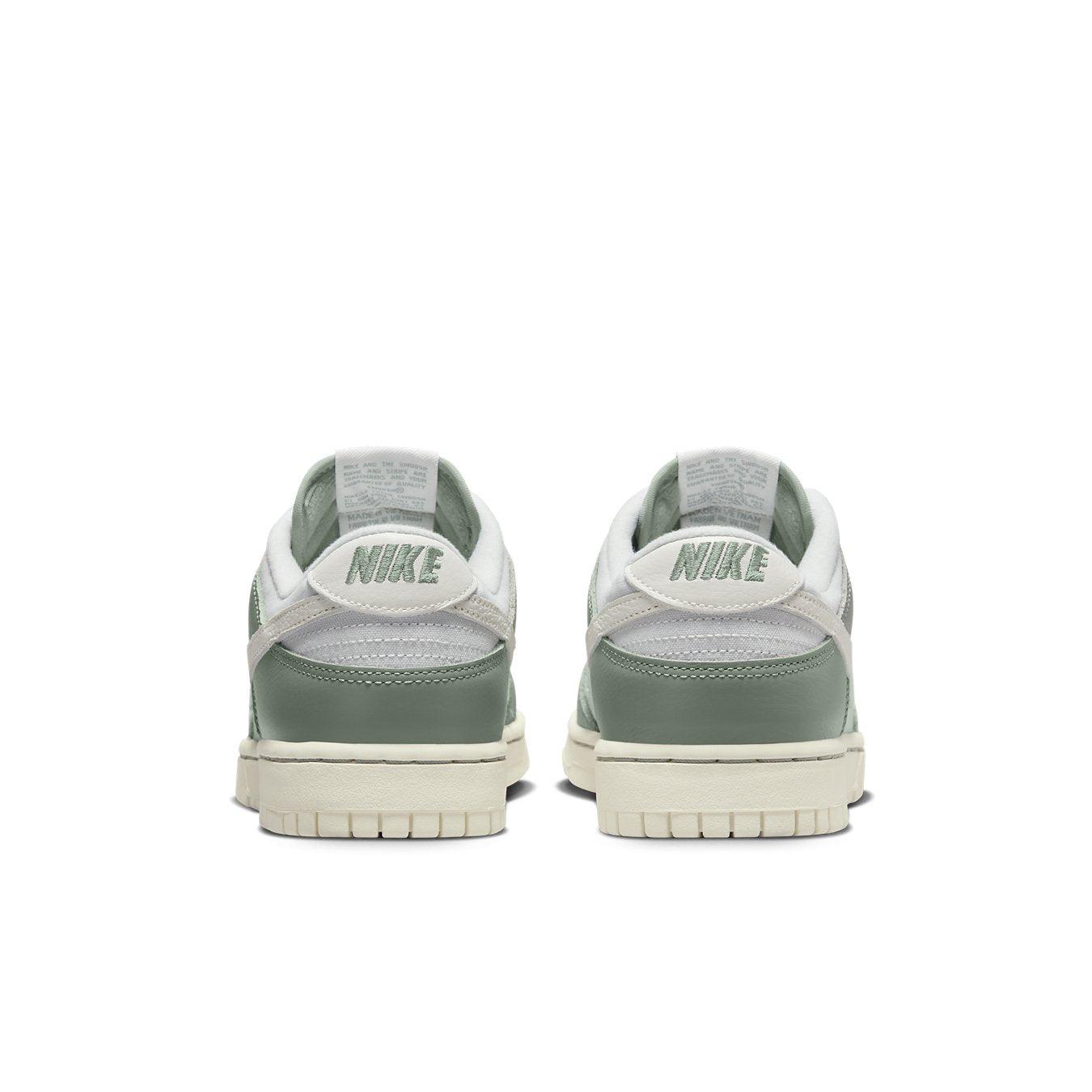Nike Dunk Low Mica Green sneakers back view with vintage-inspired design and muted green accents.
