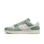 Nike Dunk Low in Mica Green featuring vintage canvas and leather design for a stylish summer look.