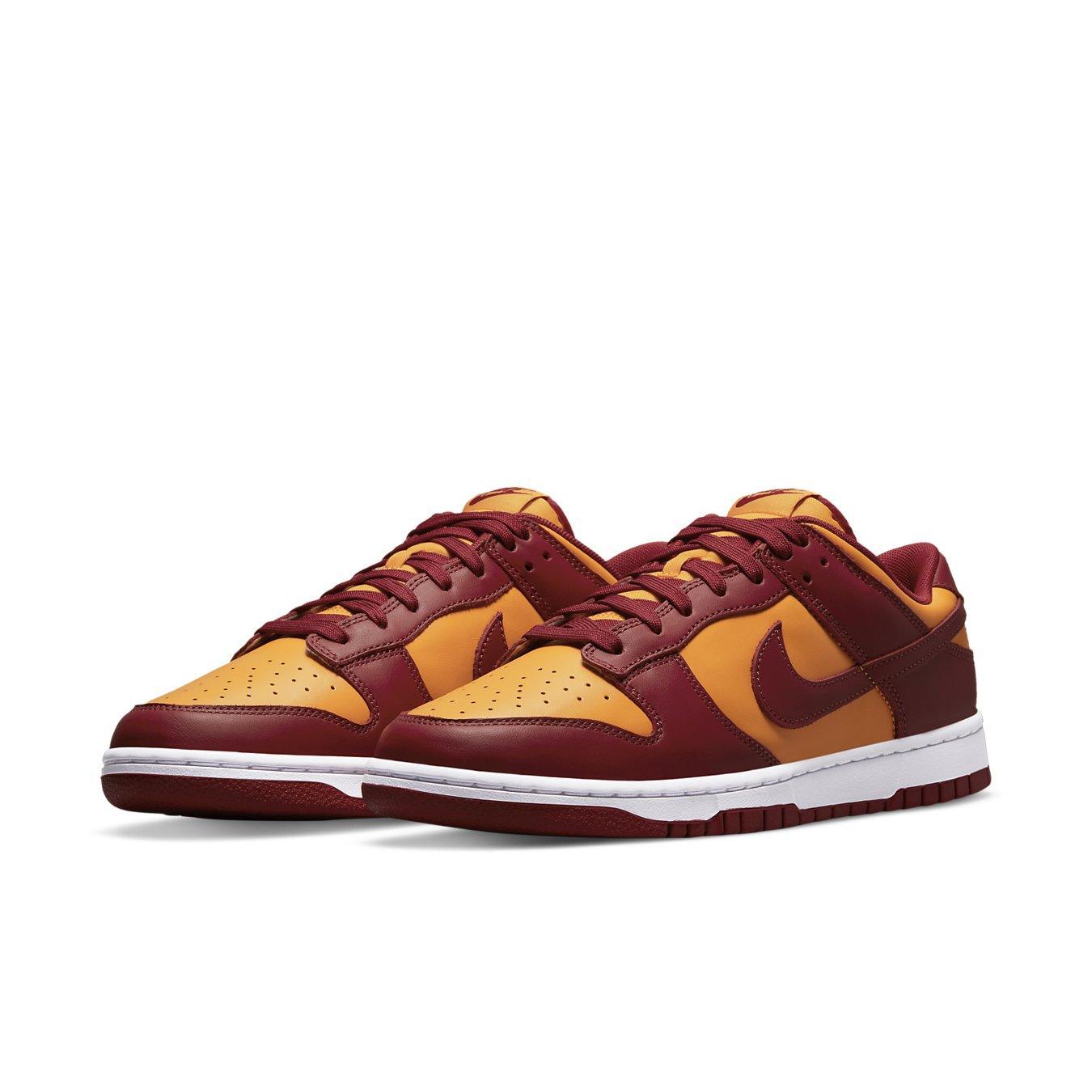 Nike Dunk Low Midas Gold with yellow-gold upper, Tough Red accents, and white midsole.