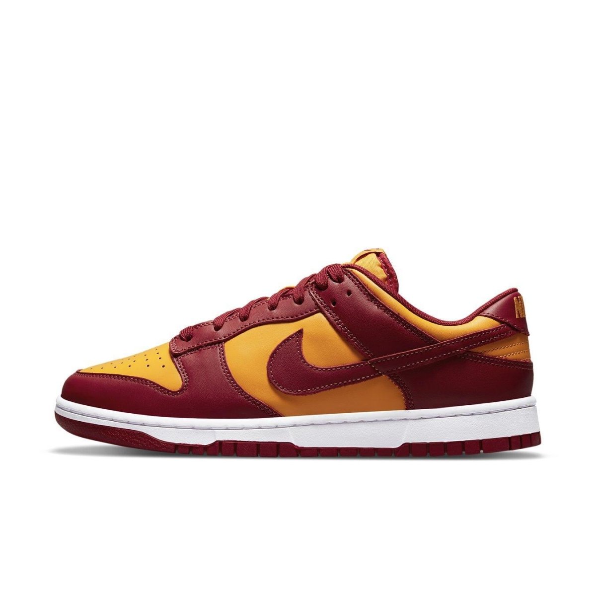 Nike Dunk Low Midas Gold sneaker in yellow, red, and white leather, showcasing stylish color blocking.