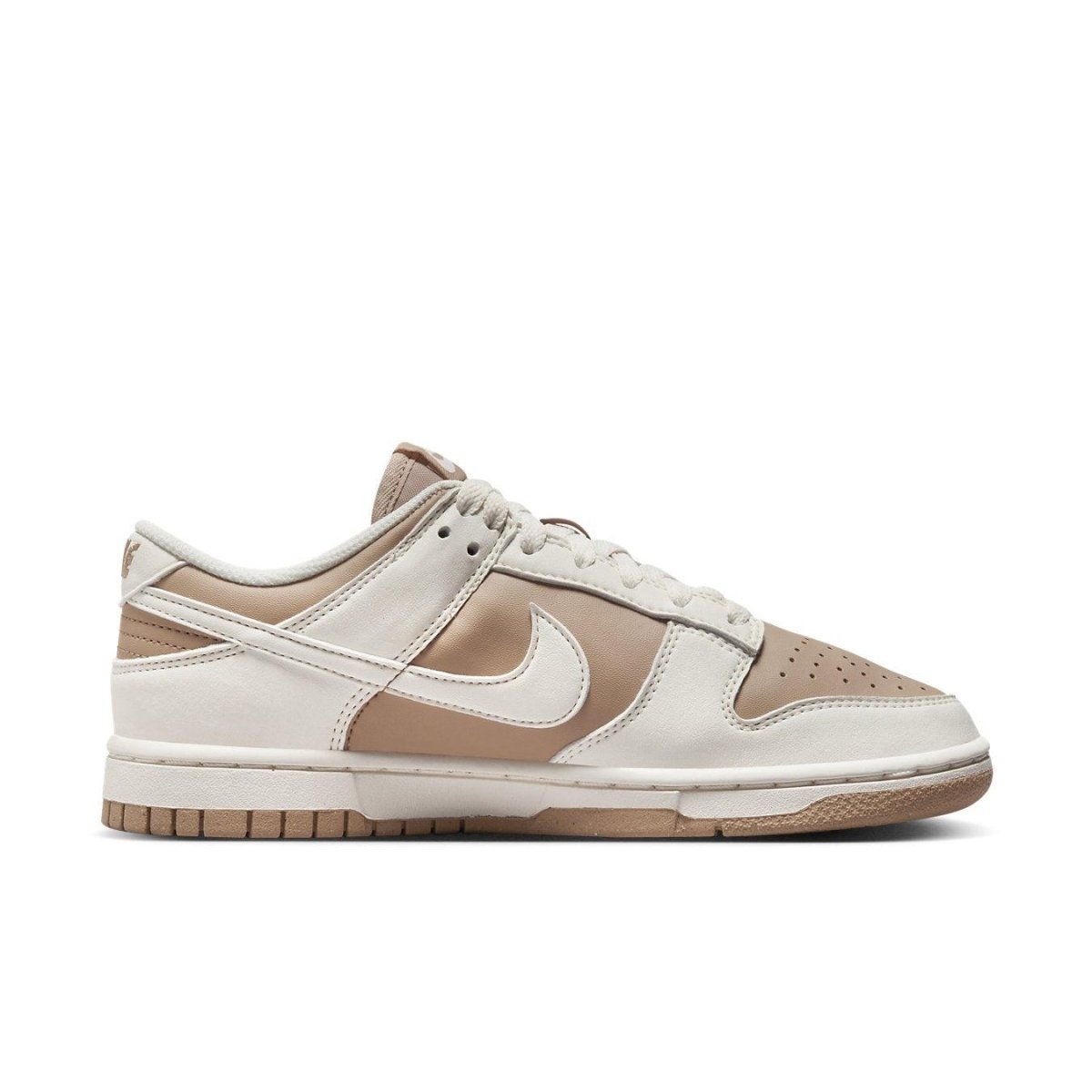 Nike Dunk Low Next Nature Beige Sail women's sneaker showcasing a casual design with earthy tones and perforated details.