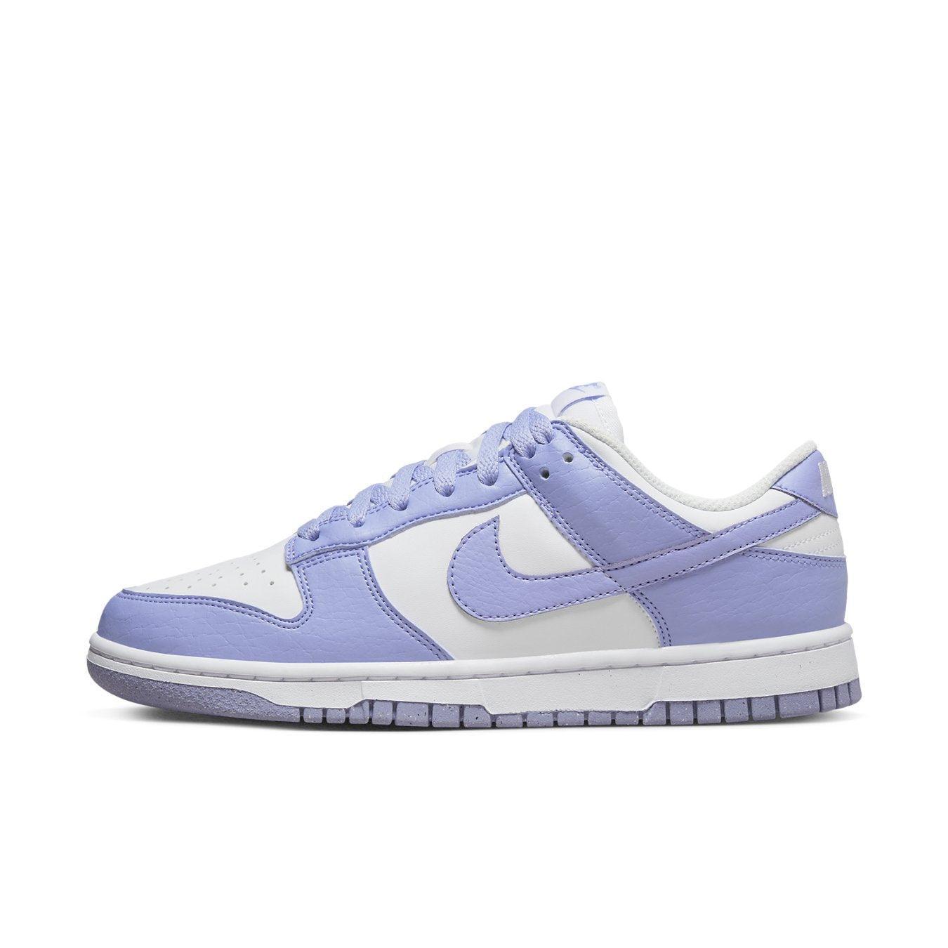 Nike Dunk Low Next Nature Lilac for women, featuring a white base with lilac-colored overlays.