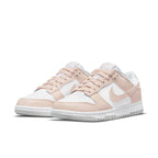 Nike Dunk Low Next Nature 'Pale Coral' sneakers for women with pink and white colorway and sustainable design.