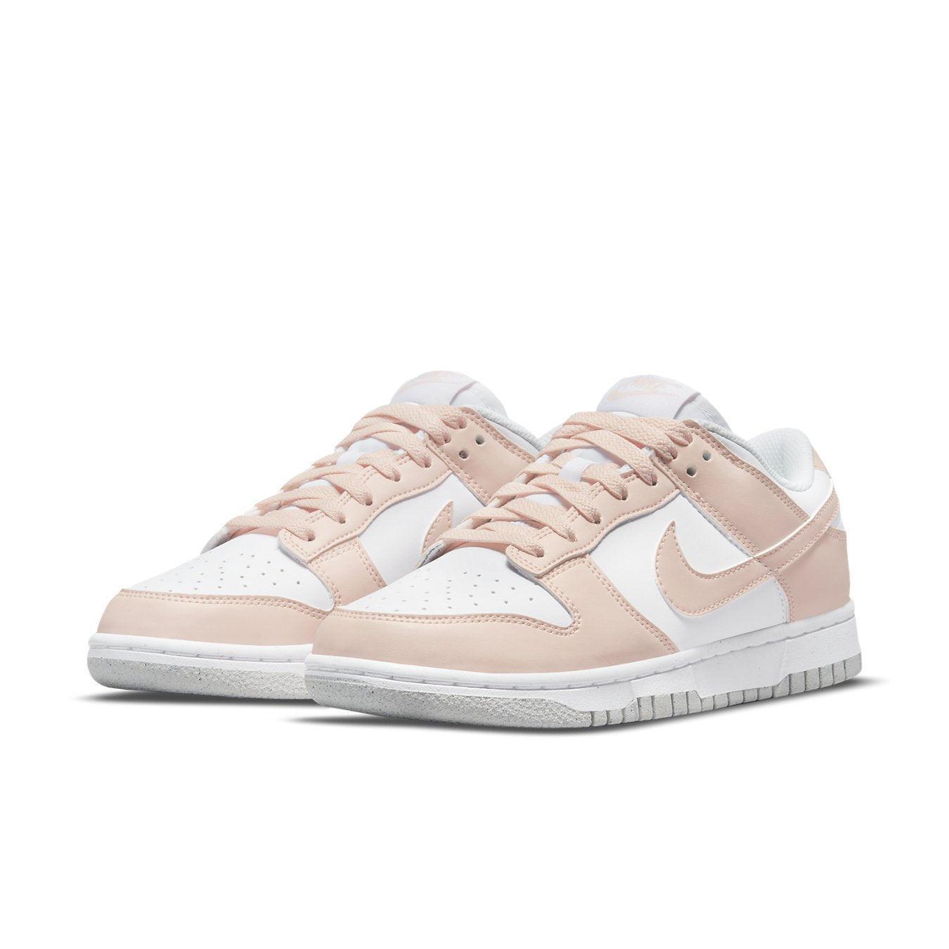 Nike Dunk Low Next Nature 'Pale Coral' sneakers for women with pink and white colorway and sustainable design.