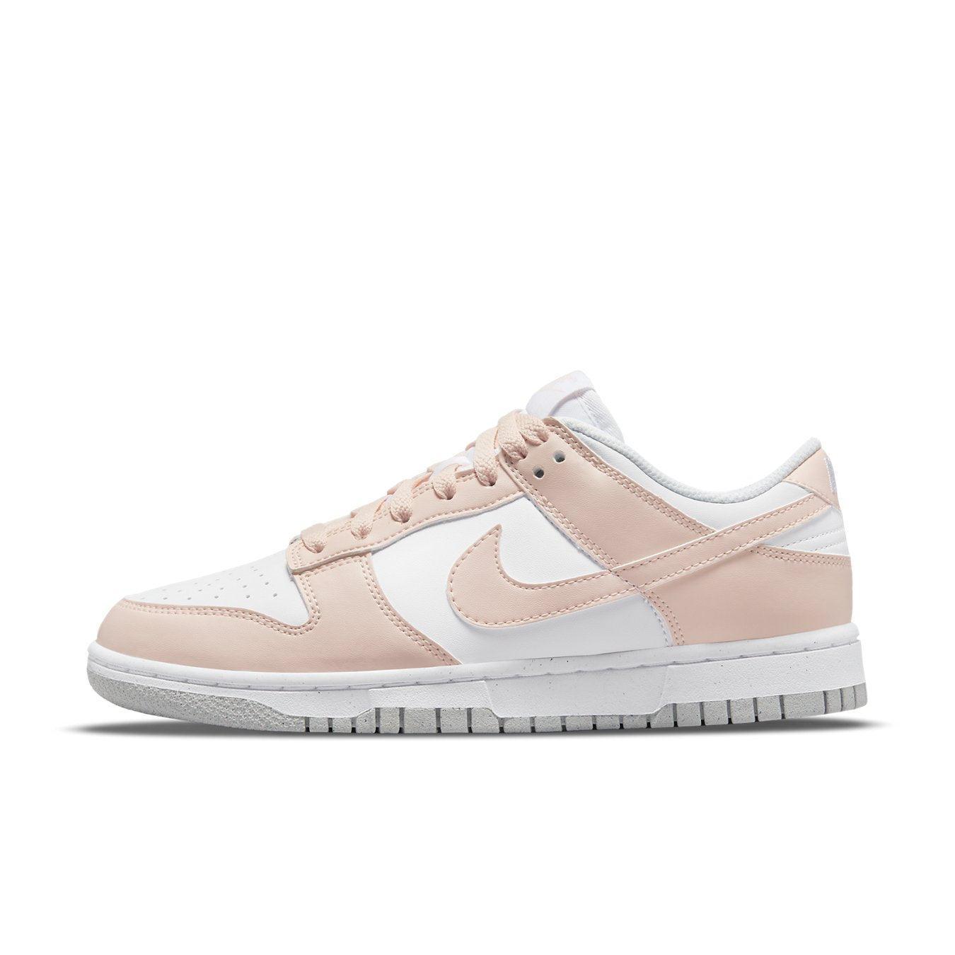 Nike Dunk Low Next Nature Pale Coral for women, featuring a white and pale pink design and sustainable materials.
