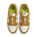 Nike Dunk Low Next Nature Phantom women's sneakers with white and amber color blocking and Volt logo on the insole.