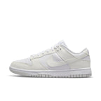 Nike Dunk Low Next Nature Sail (W) in white, featuring breathable design and textured outsole for optimal traction.