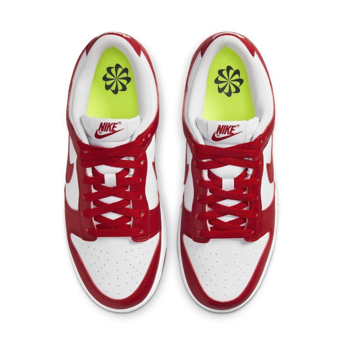 Nike Dunk Low Next Nature in white and red, featuring a leather upper and unique Volt insoles.
