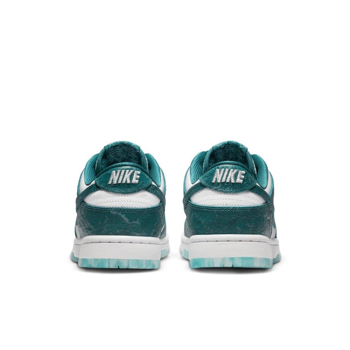 Nike Dunk Low Ocean women's sneakers, featuring a textured teal upper and white sole, showcasing the heel design.