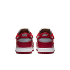 Rear view of Nike Dunk Low Off-White University Red sneakers showcasing red leather and waffle linings.