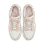 Nike Dunk Low Orange Pearl (W) sneakers in pink and white from above view.