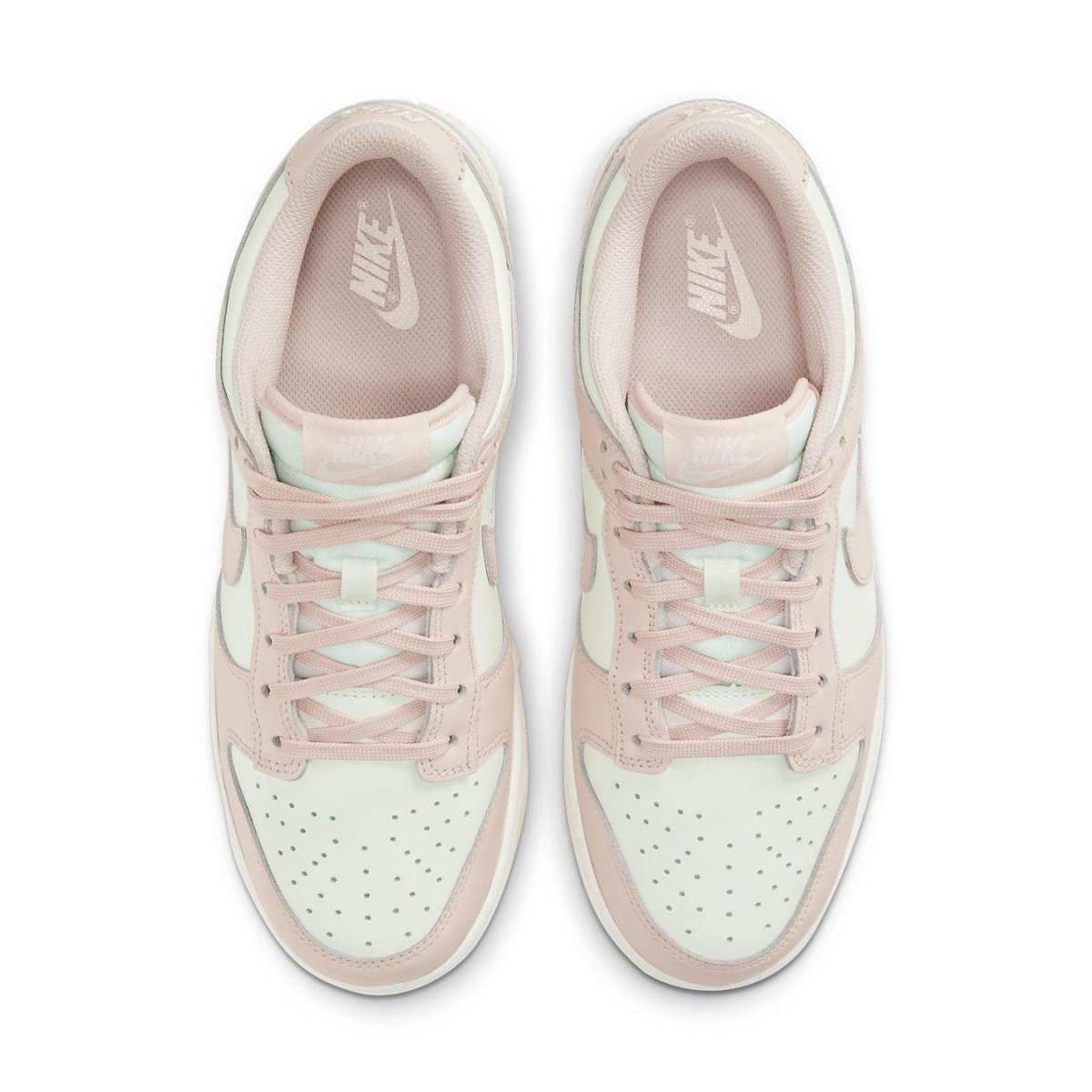 Nike Dunk Low Orange Pearl (W) sneakers in pink and white from above view.