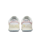 Retro Nike Dunk Low Oxidized back view showcasing pastel pink and faded yellow accents.