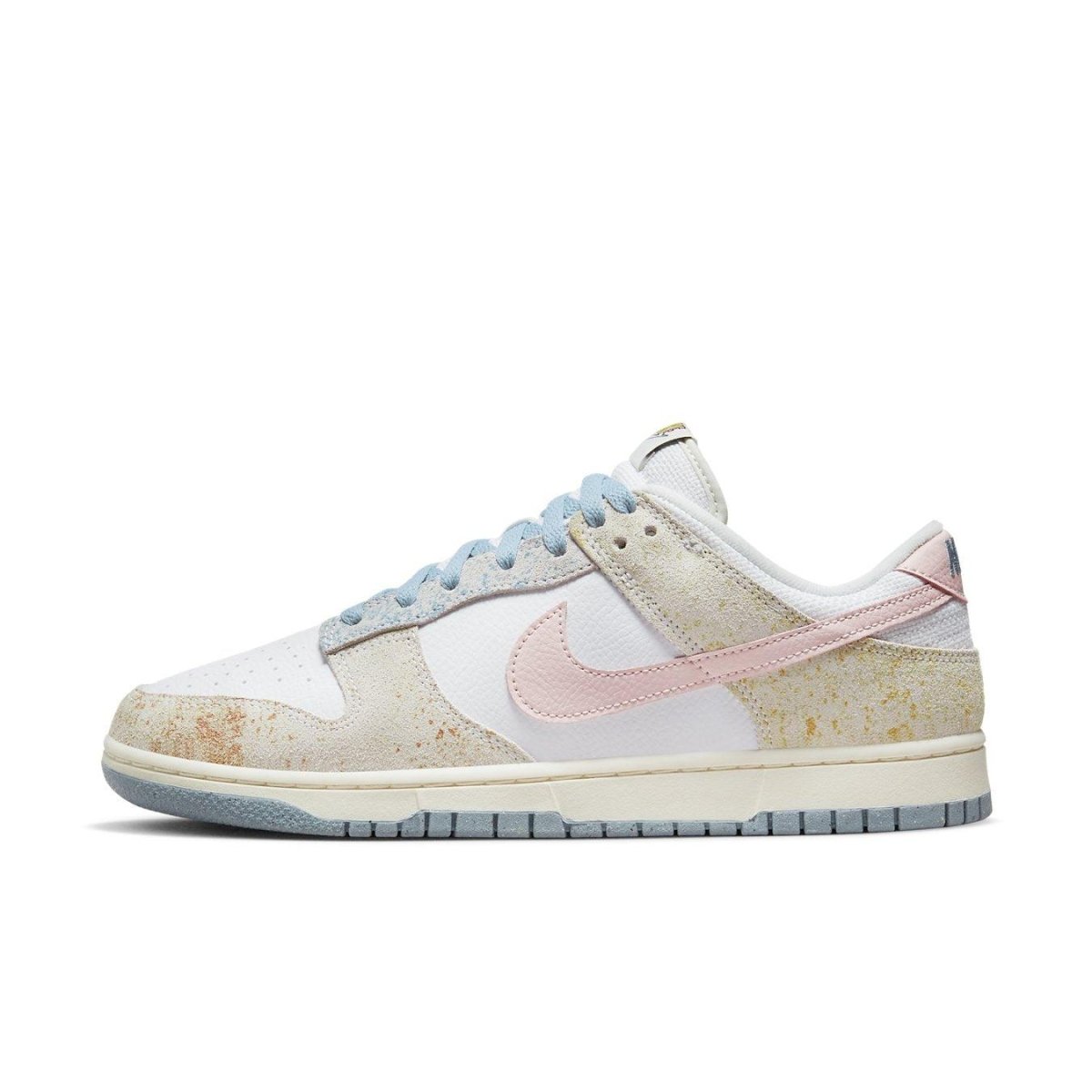 Nike Dunk Low Oxidized in pastel tones of blue, pink, and light yellow with a worn suede finish.