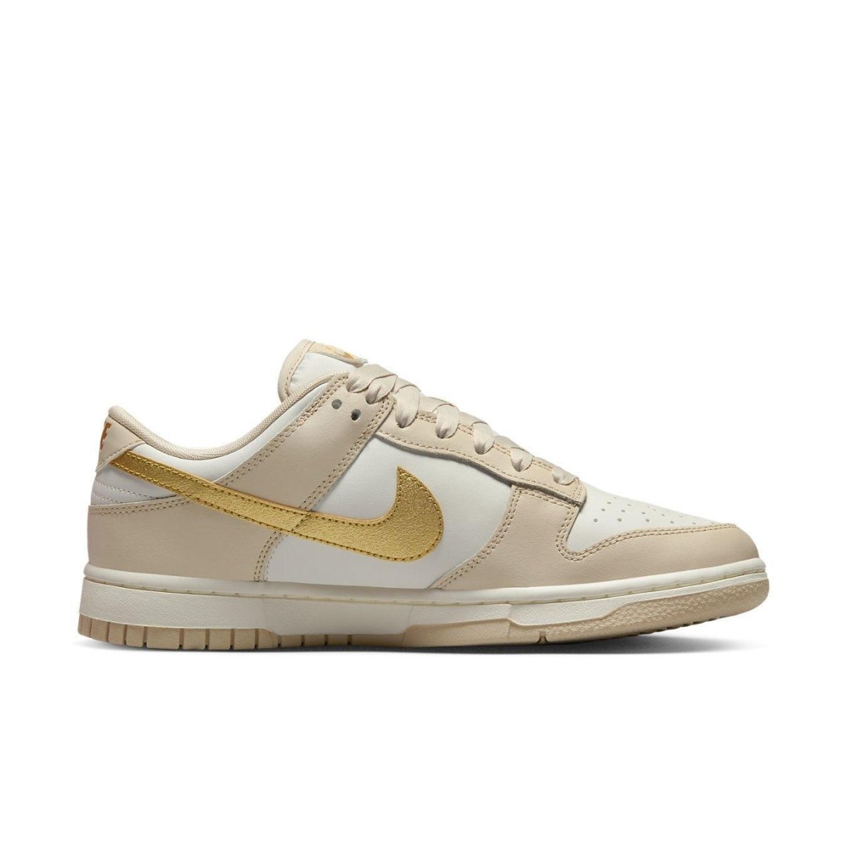 Nike Dunk Low Phantom Metallic Gold (W) with beige and white leather, featuring a gold Swoosh and a clean, versatile design.