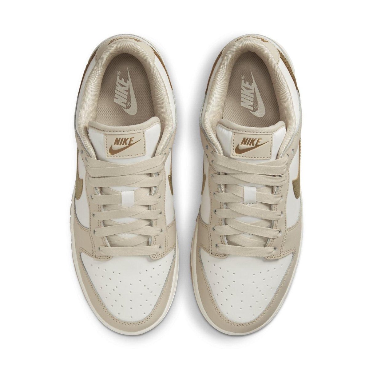 Nike Dunk Low Phantom Metallic Gold women's sneakers in smooth white leather with beige accents and gold details.