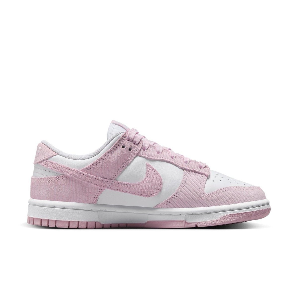 Nike Dunk Low Pink Corduroy Women’s sneakers featuring pastel pink corduroy and white leather, side view.