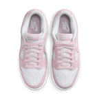 Nike Dunk Low Pink Corduroy Women's sneakers featuring pastel pink corduroy and smooth leather accents.