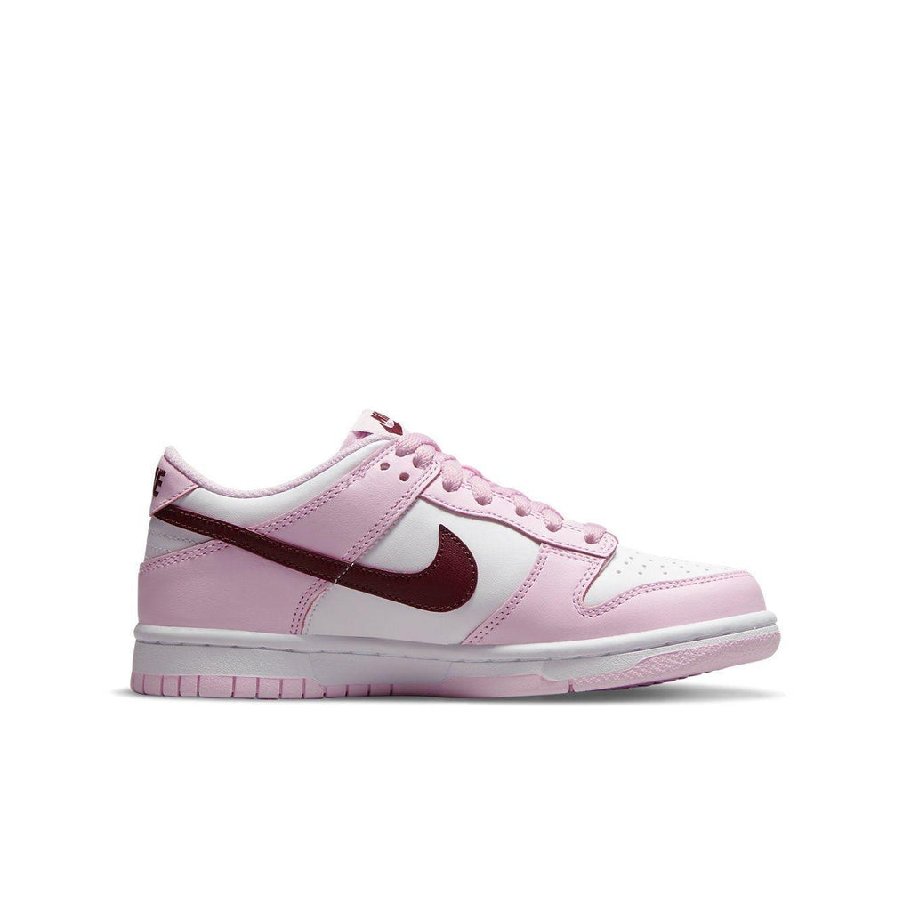 Nike Dunk Low Pink Foam Red White (GS) featuring white leather base with pink overlays and Deep Red Swoosh detail.