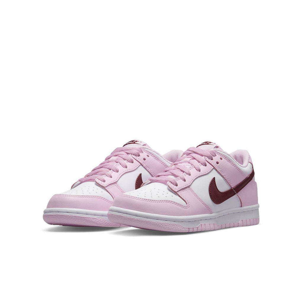 Nike Dunk Low Pink Foam Red White (GS) featuring white leather base with pink overlays and Deep Red Swoosh.