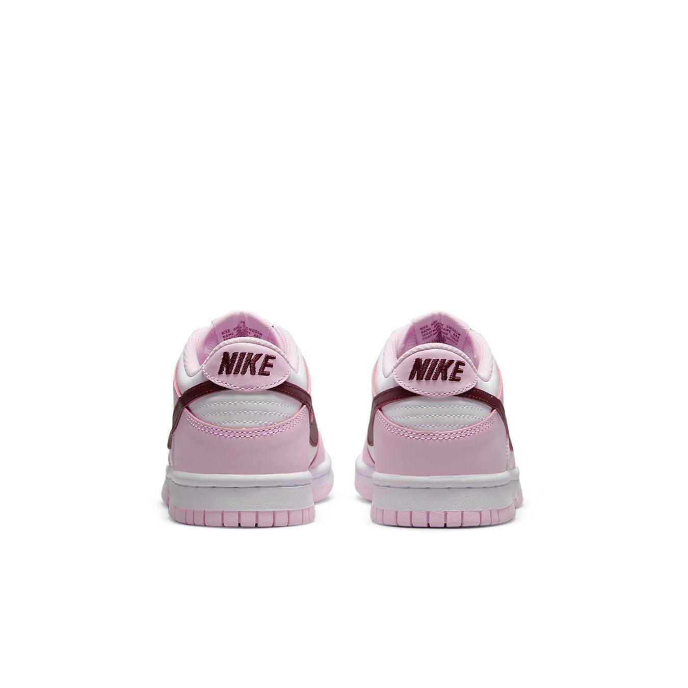 Nike Dunk Low Pink Foam Red White (GS) rear view showcasing pink and white leather design with Deep Red accents.