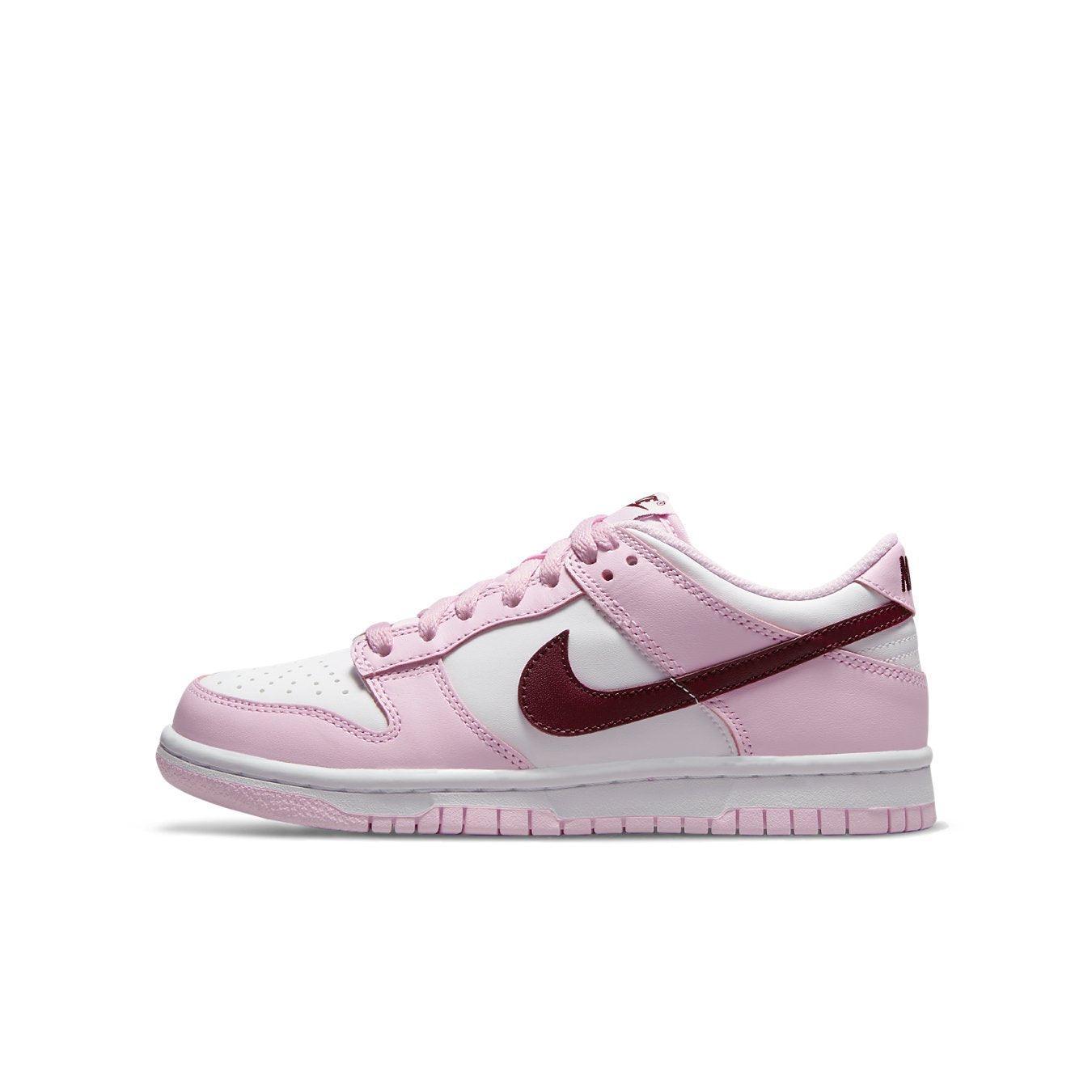 Nike Dunk Low Pink Foam Red White sneakers featuring a white leather base with pink overlays and a Deep Red Swoosh.