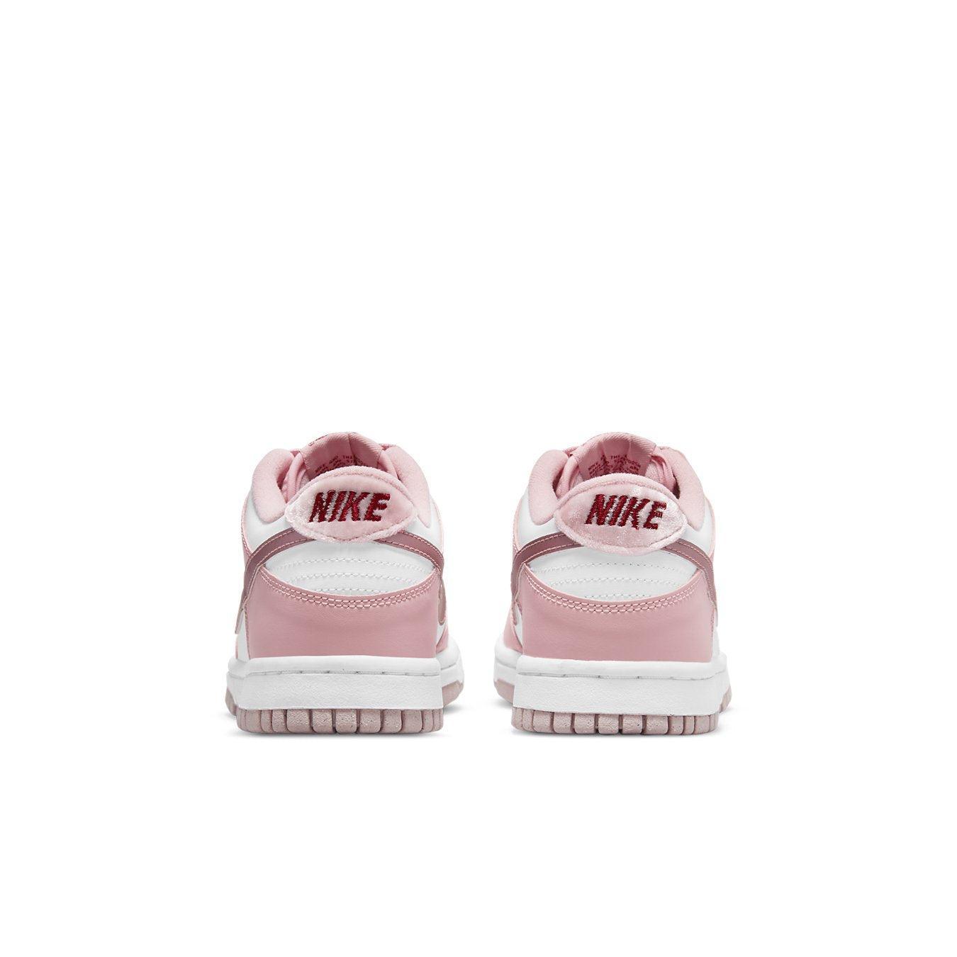 Nike Dunk Low Pink Velvet (GS) back view showcasing pink and white leather design with glossy Swoosh.