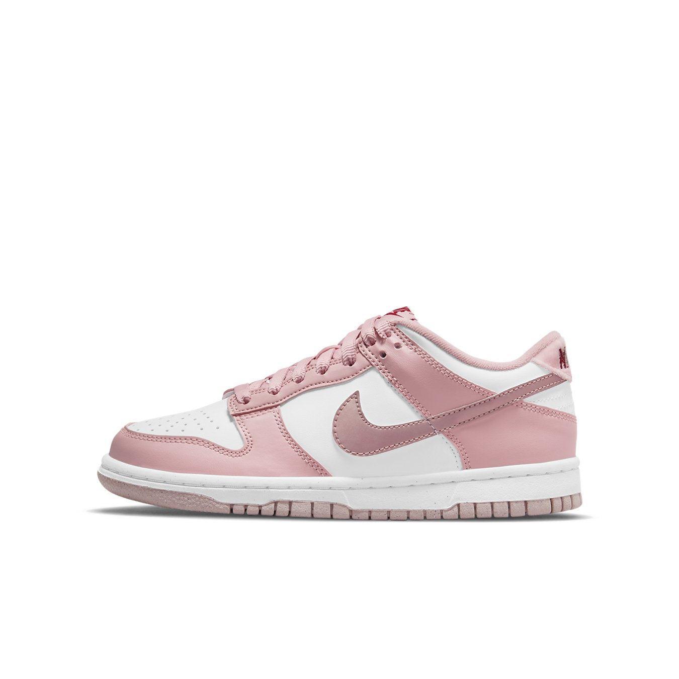 Nike Dunk Low Pink Velvet (GS) with white and pink leather upper and shiny Swoosh detail.