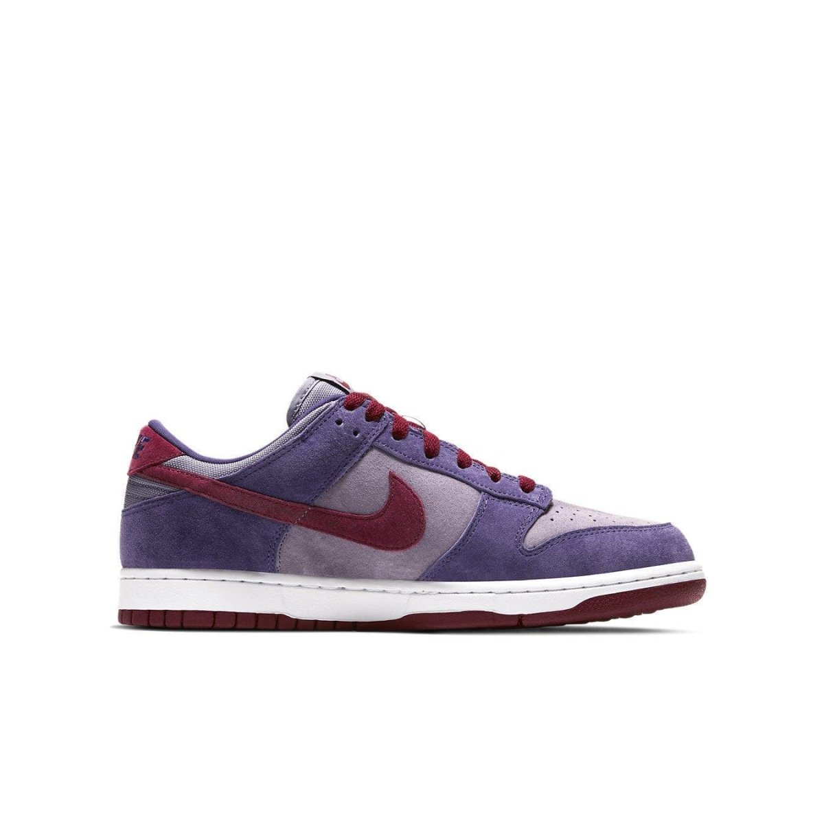 Nike Dunk Low Plum (2020) in purple and burgundy, featuring a suede upper and iconic Nike swoosh.