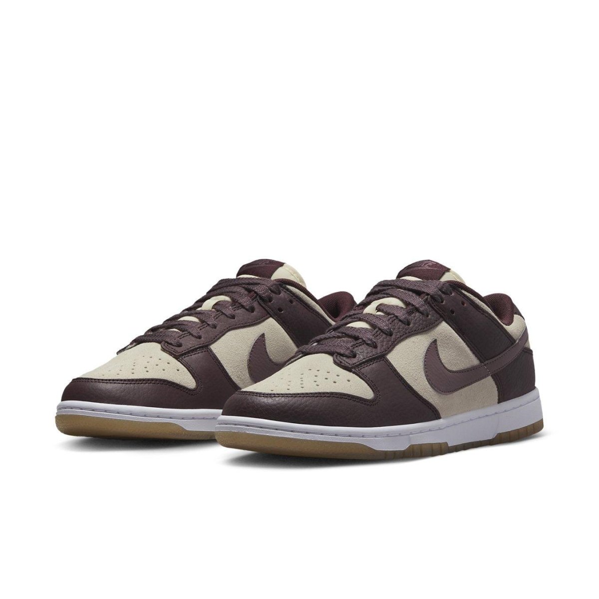 Nike Dunk Low Plum Coconut Milk women's sneakers featuring brown-purple leather panels and beige suede base.