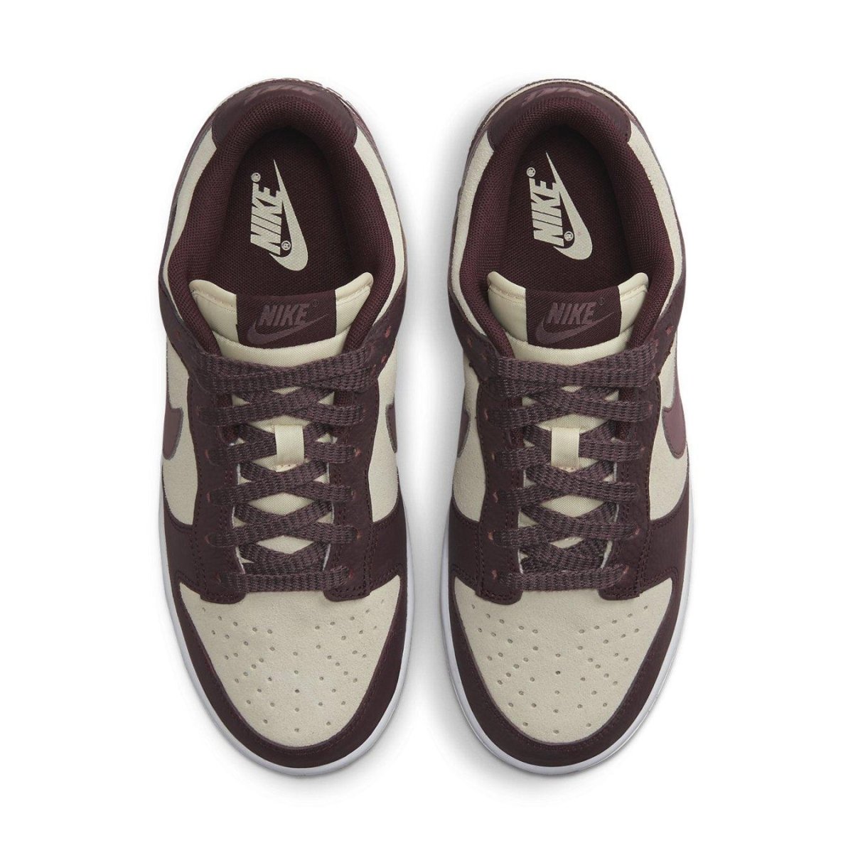 Nike Dunk Low Plum Coconut Milk women's sneakers in brown-purple and beige, with textured upper and iconic Swoosh logo.