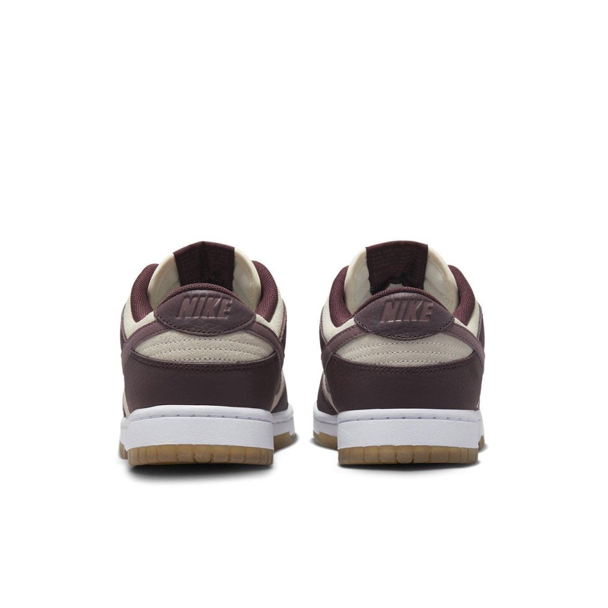 Nike Dunk Low Plum Coconut Milk women's sneakers rear view with brown-violet panels and beige suede.