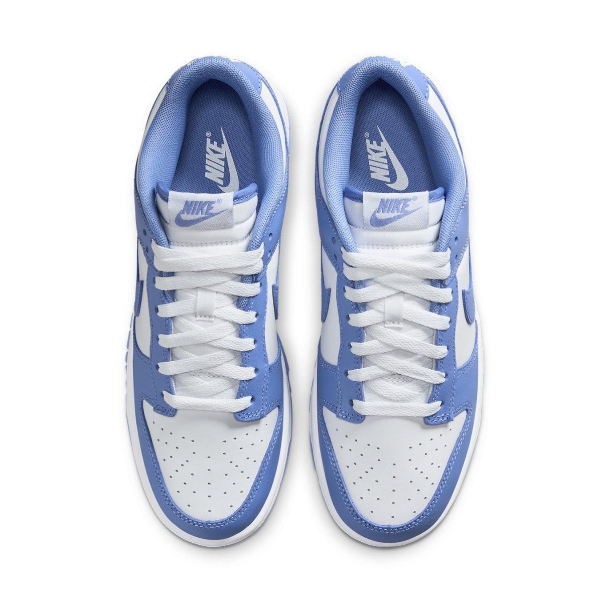 Nike Dunk Low Polar Blue sneakers featuring white and steel blue colorway with breathable nylon tongue.
