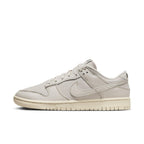 Nike Dunk Low Premium Light Orewood Brown sneaker featuring a breathable ivory canvas upper and leather overlays.