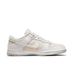 Nike Dunk Low Premium Vast Grey sneaker featuring beige and gray suede upper.