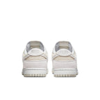 Nike Dunk Low Premium Vast Grey rear view showcasing beige and grey suede design with Nike logo.