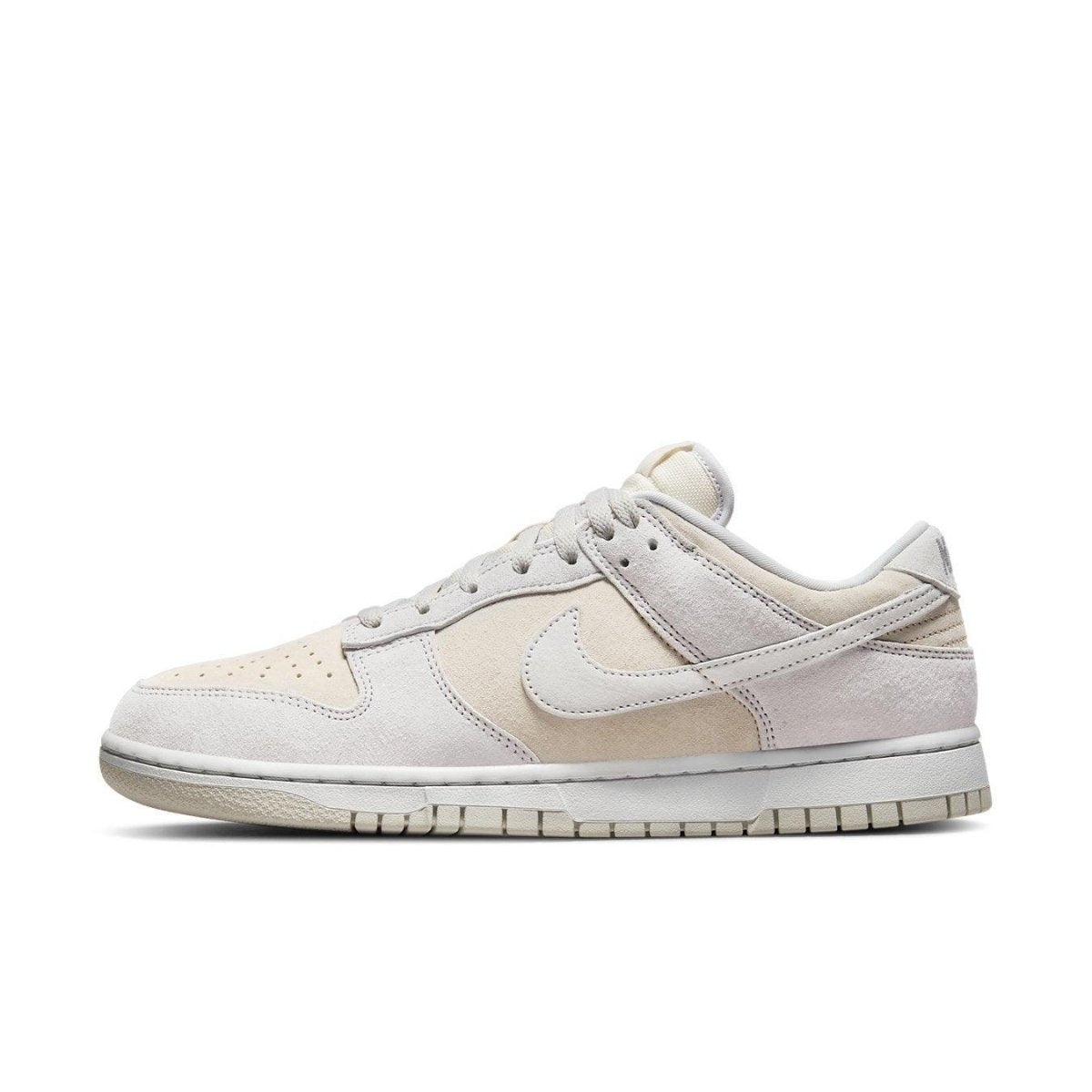 Nike Dunk Low Premium Vast Grey sneakers featuring beige and grey suede upper with classic design elements.