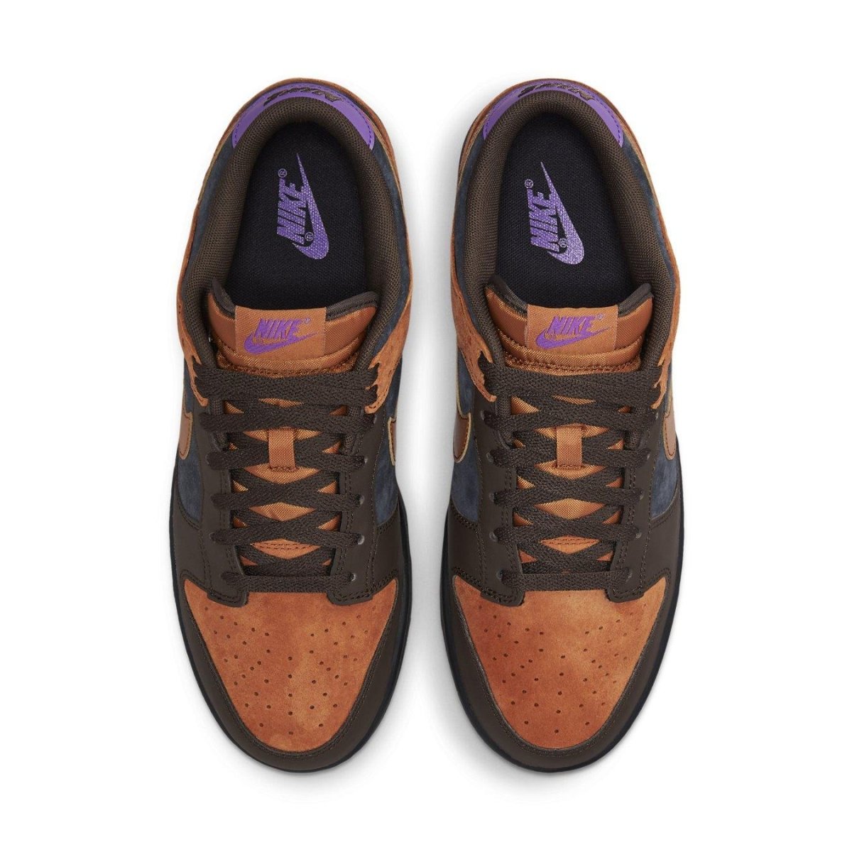 Nike Dunk Low PRM Cider sneaker with orange suede, brown leather accents, and gray-blue details.