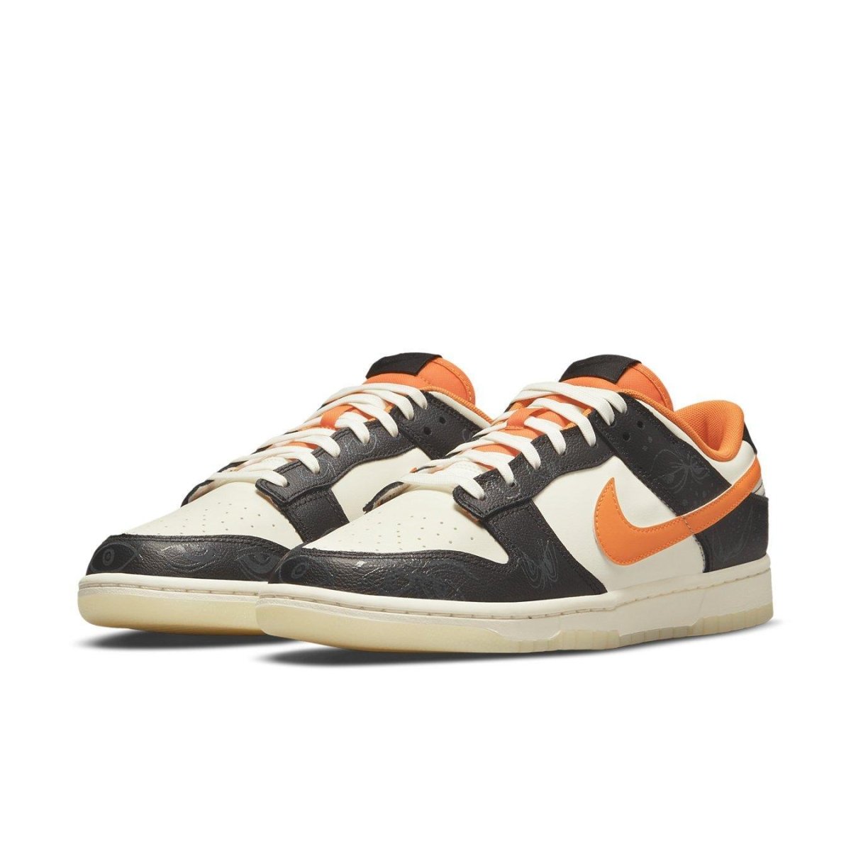 Nike Dunk Low PRM Halloween (2021) in black and white with orange accents, featuring smooth and textured leather.