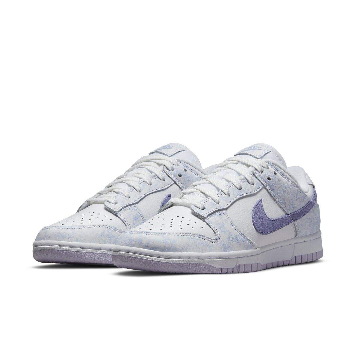 Nike Dunk Low Purple Pulse sneakers featuring tie-dye purple and yellow accents on a white base.