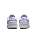 Rear view of Nike Dunk Low Purple Pulse sneakers showcasing purple and white color scheme.