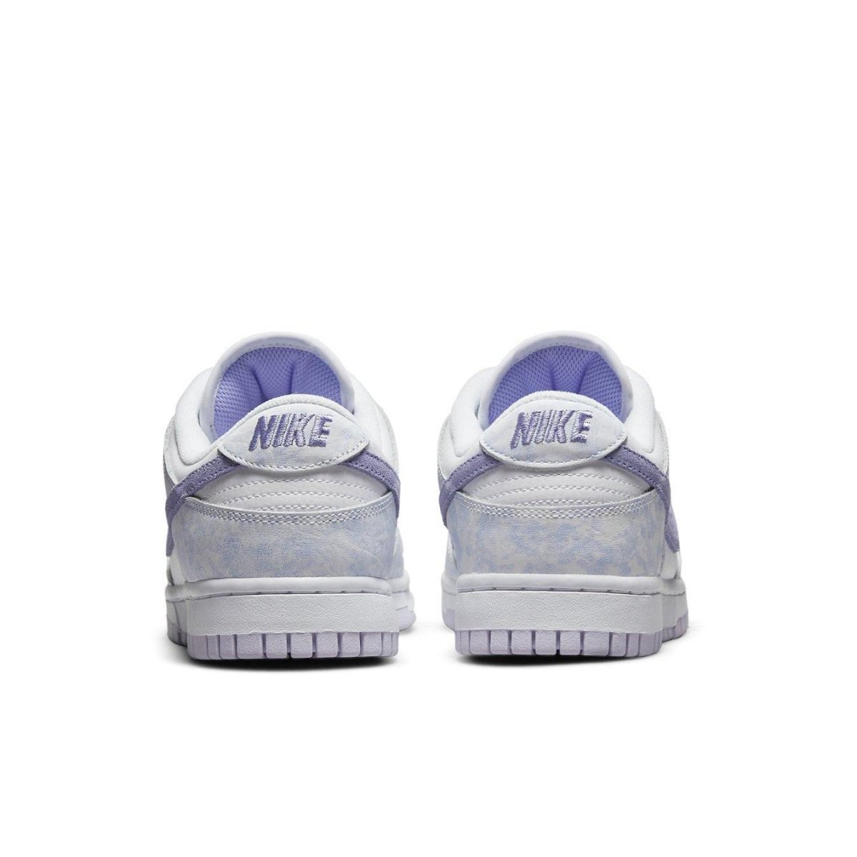 Rear view of Nike Dunk Low Purple Pulse sneakers showcasing purple and white color scheme.